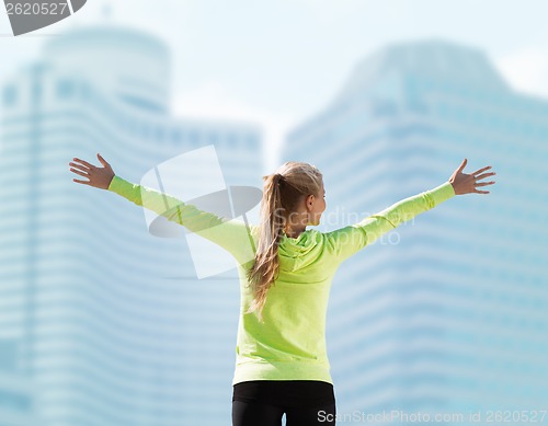 Image of woman doing sports outdoors