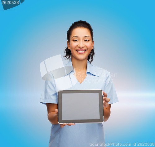 Image of smiling female doctor or nurse with tablet pc