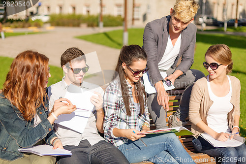 Image of group of students or teenagers hanging out