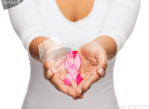 Image of hands holding pink breast cancer awareness ribbon