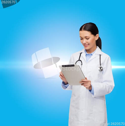 Image of female doctor with stethoscope and tablet pc