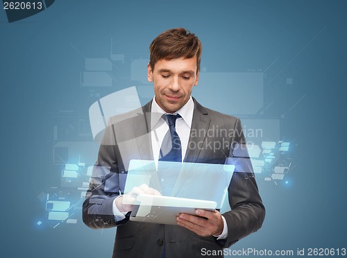 Image of buisnessman with tablet pc