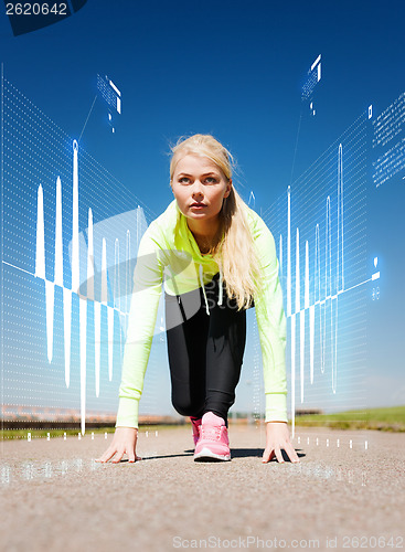 Image of concentrated woman doing running outdoors