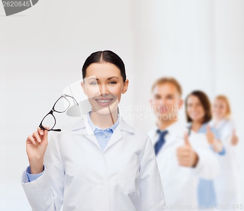 Image of smiling female doctor with eyeglasses