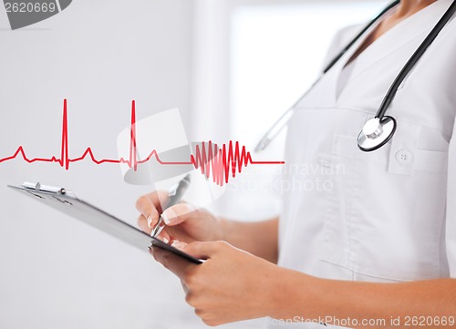 Image of female doctor with stethoscope and prescription