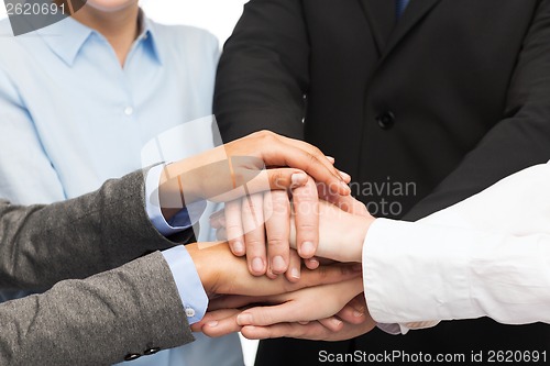 Image of group of businesspeople celebrating victory