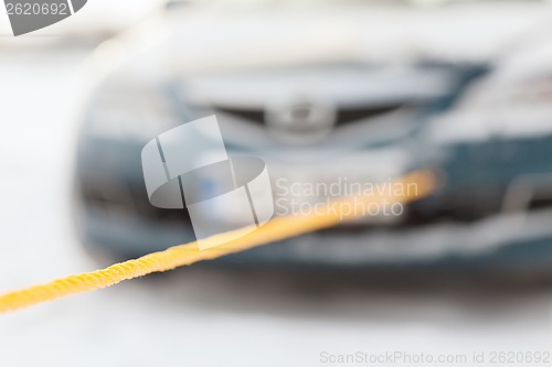 Image of closeup of towed car with towing rope