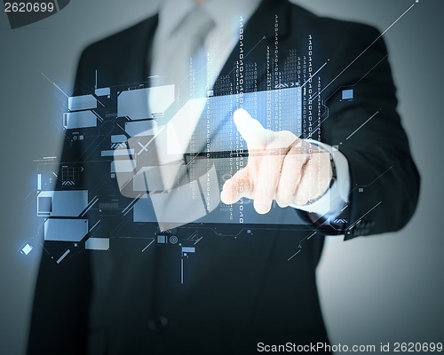 Image of man hand pointing at virtual screen