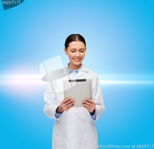 Image of female doctor without stethoscope and tablet pc