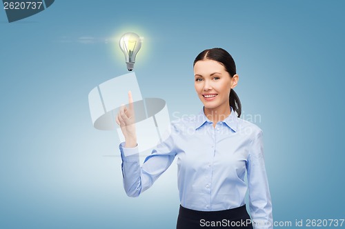 Image of woman working with imaginary virtual screen