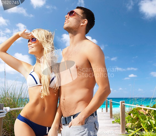 Image of beautiful couple on the beach