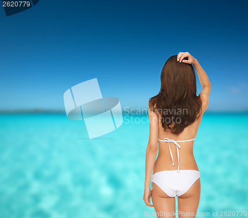 Image of beutiful woman posing in white bikini