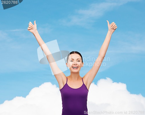 Image of girl in blank purple tank top with crossed arms