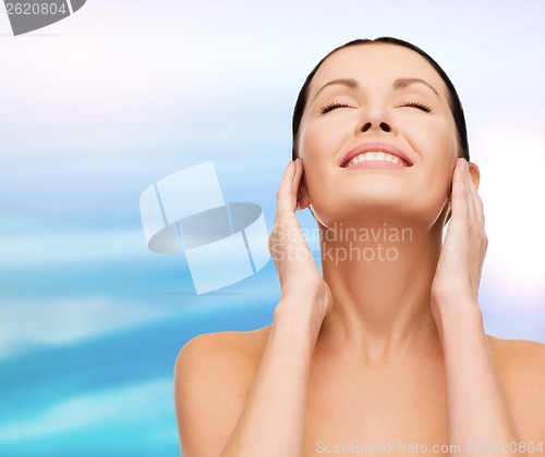 Image of face of young smiling woman