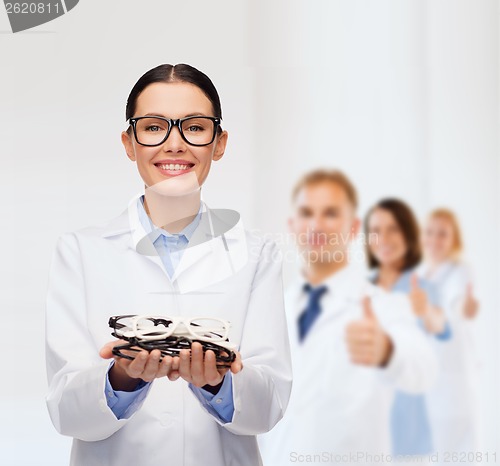 Image of smiling female doctor with eyeglasses