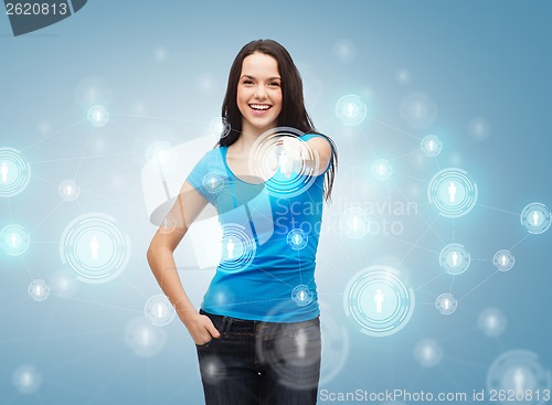 Image of happy girl in t-shirt pointing at social network