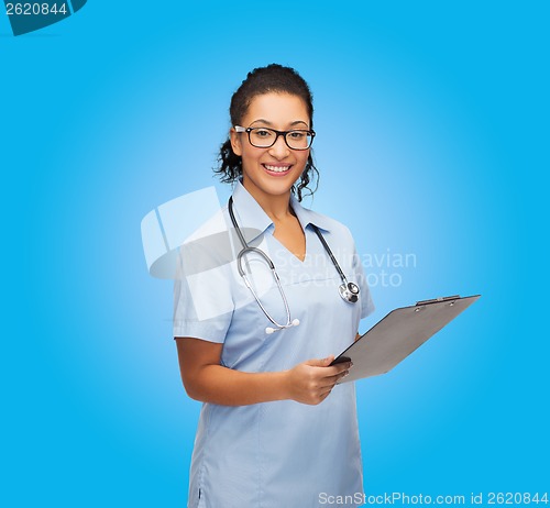 Image of smiling female african american doctor or nurse