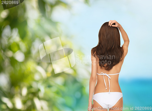 Image of beutiful woman posing in white bikini