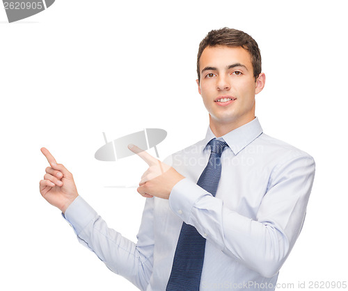 Image of man pointing finger to something on virtual screen