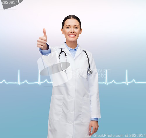 Image of smiling female doctor showing thumbs up