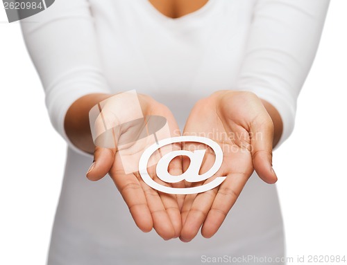 Image of womans cupped hands showing e-mail cutout sign