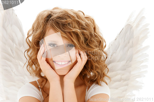 Image of happy teenage angel girl