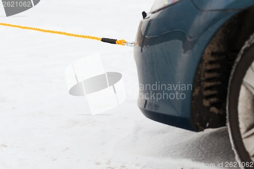 Image of closeup of towed car with towing rope