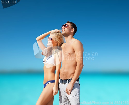 Image of beautiful couple on the beach