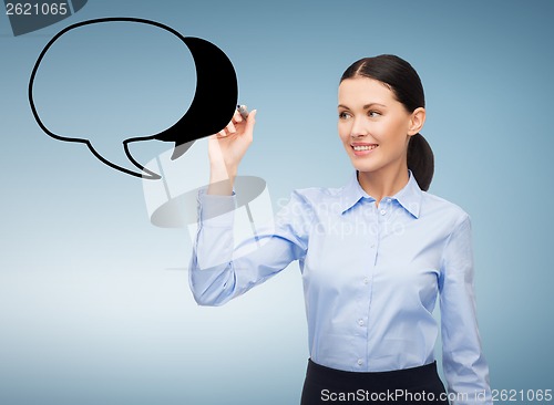 Image of businesswoman drawing text bubble in the air