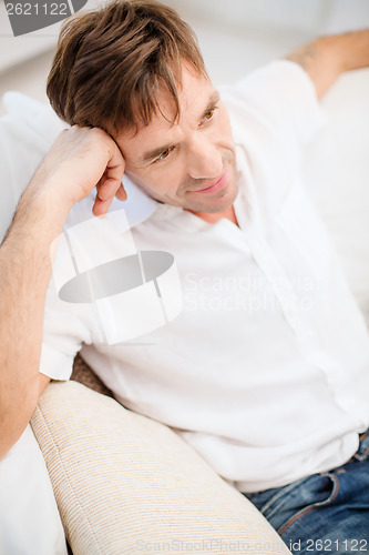 Image of middle-aged man at home