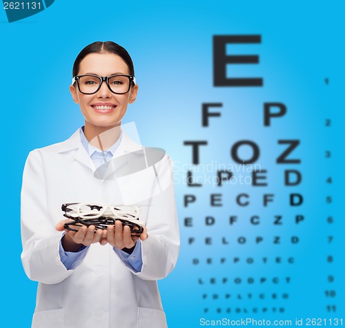 Image of smiling female doctor with eyeglasses