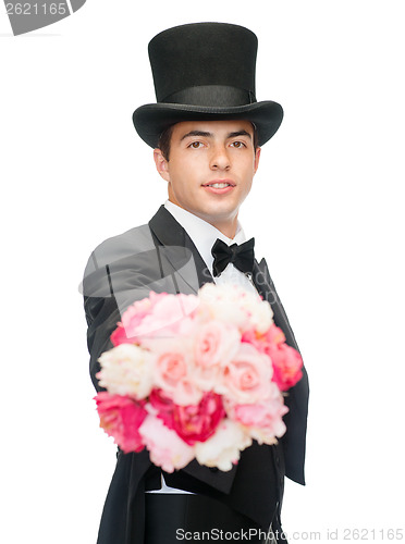 Image of magician with flower bouquet