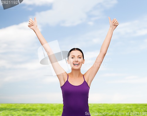 Image of girl in blank purple tank top with crossed arms