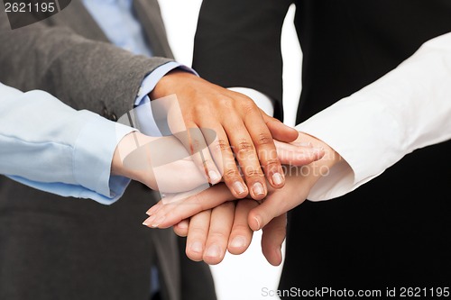 Image of group of businesspeople celebrating victory