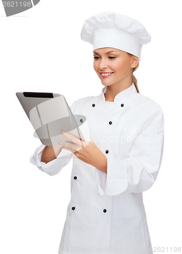 Image of smiling female chef with tablet pc computer