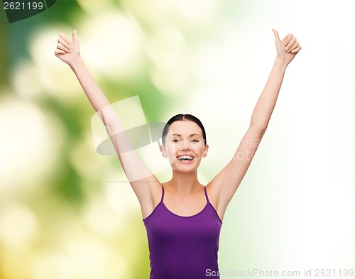 Image of girl in blank purple tank top with crossed arms