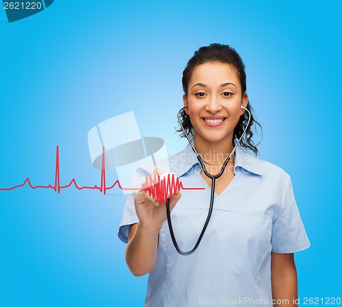 Image of smiling female african american doctor or nurse