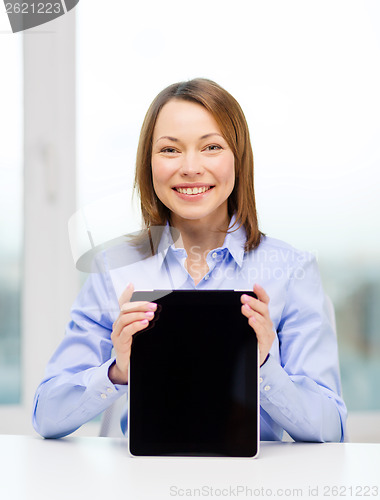 Image of smiling businesswoman with tablet pc computer