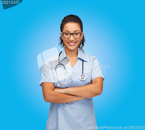 Image of smiling female african american doctor or nurse