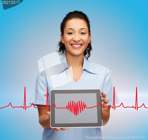 Image of smiling female doctor or nurse with tablet pc