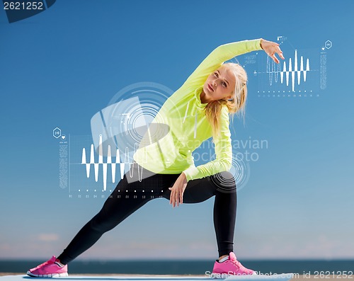 Image of woman doing sports outdoors