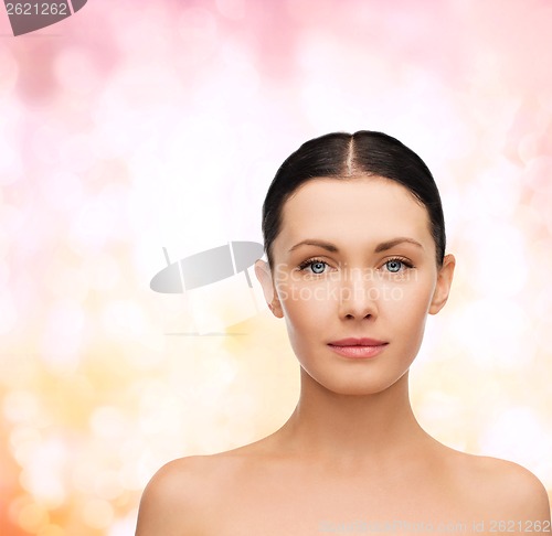 Image of face and shoulders of beautiful woman