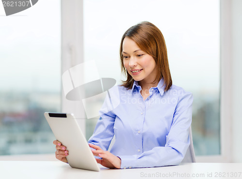 Image of smiling businesswoman or student with tablet pc