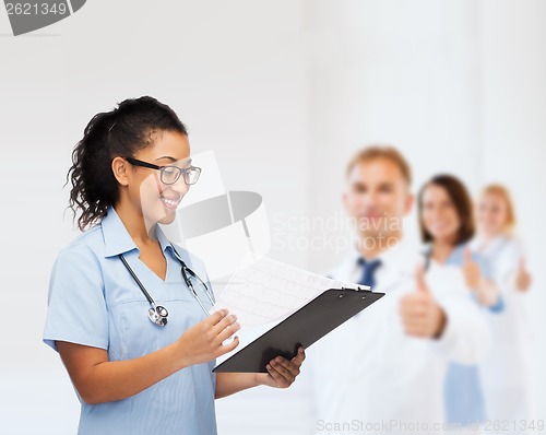 Image of smiling female african american doctor or nurse