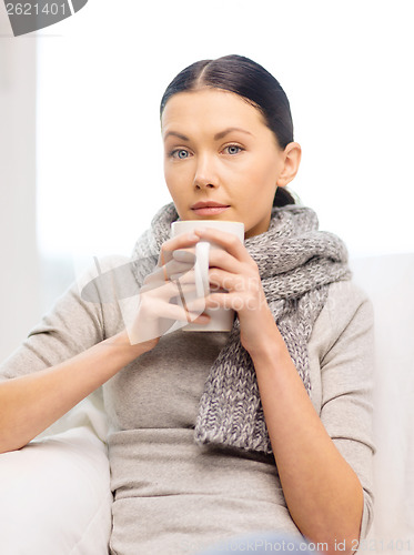 Image of ill woman with flu at home