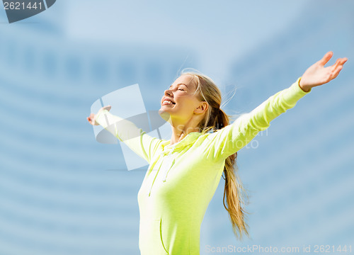 Image of woman doing sports outdoors