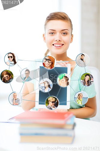 Image of smiling student girl with tablet pc