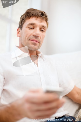 Image of buisnessman with smartphone