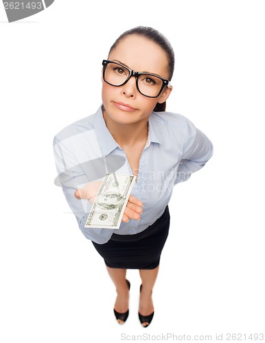 Image of smiling businesswoman with dollar cash money