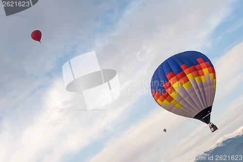 Image of Multicolored Balloon in the blue sky